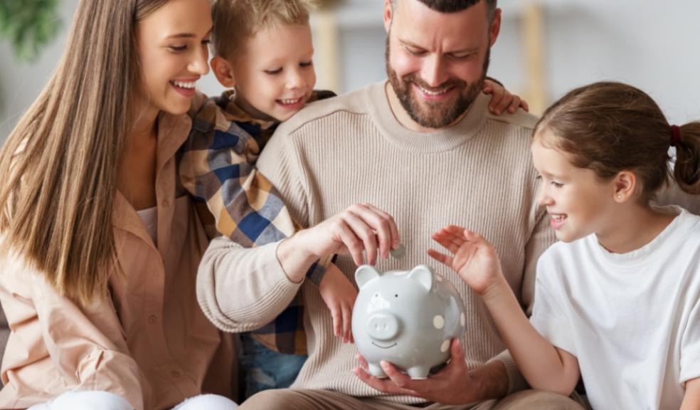 picture of a family saving money in a piggy bank