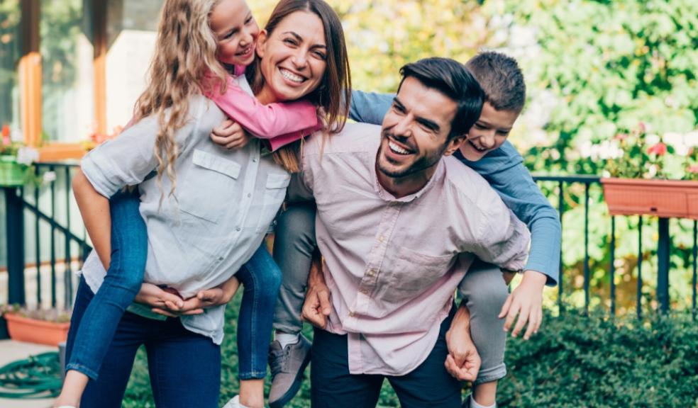 happy nuclear family outside picture of a happy nuclear family outside