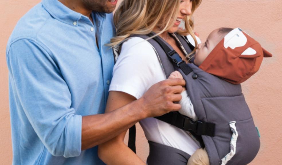 Picture of a couple with the new infantino baby carrier