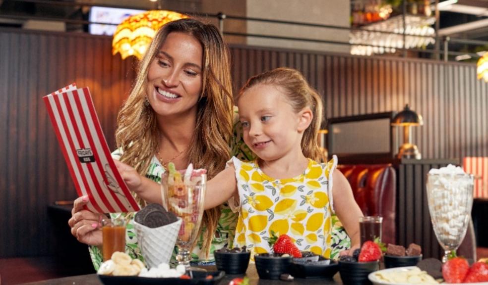picture of Fern Mcann with her daughter Sunday at Friday's restaurant