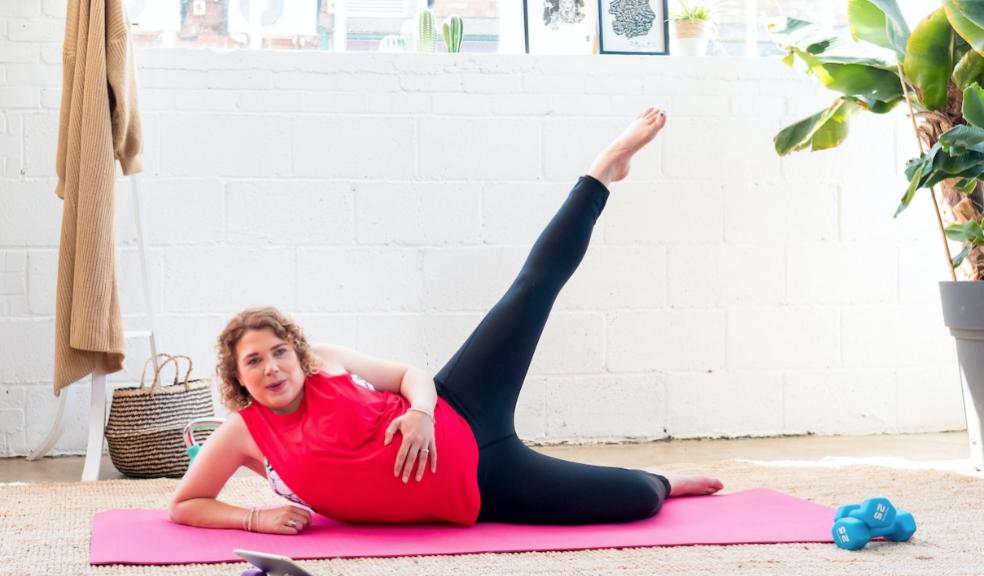 picture of a pregnant woman doing pilates