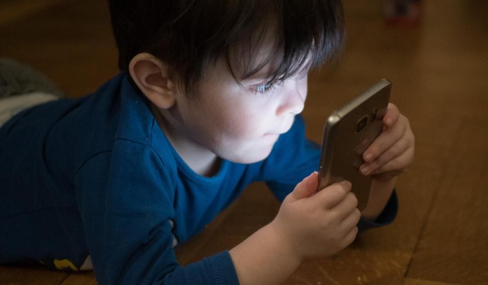 picture of a child on a smartphone