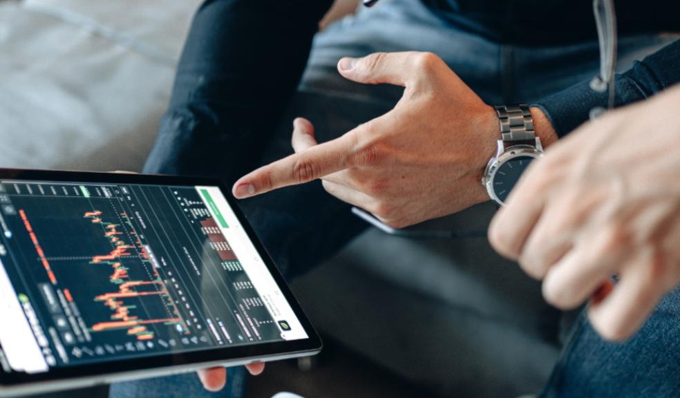 learning about crypto currency on a device picture of someone learning about crypto currency on a device