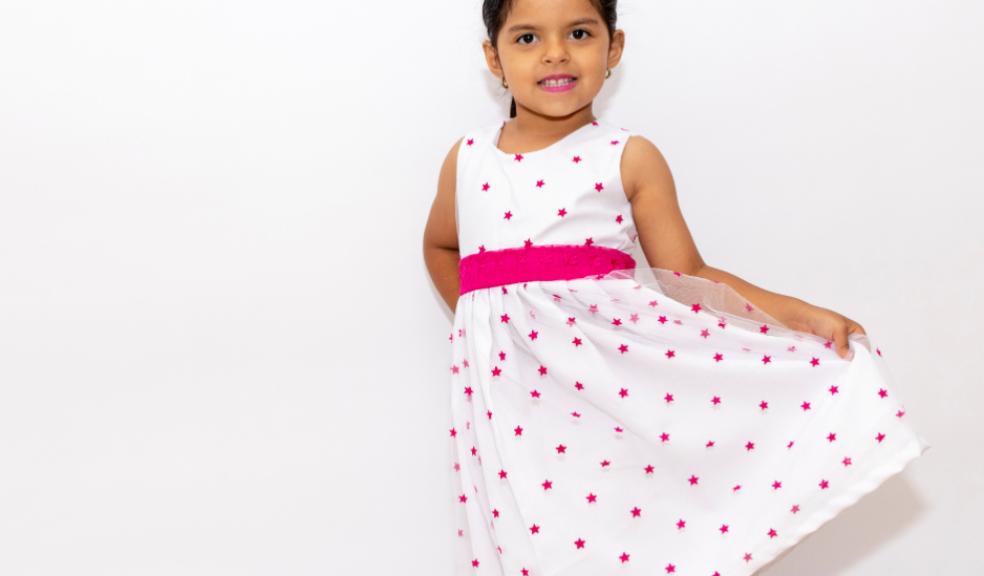 picture of a little girl wearing a dress