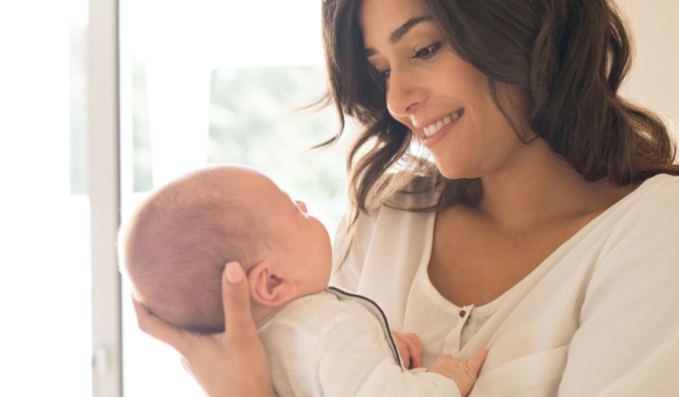 picture of a mother looking at her baby