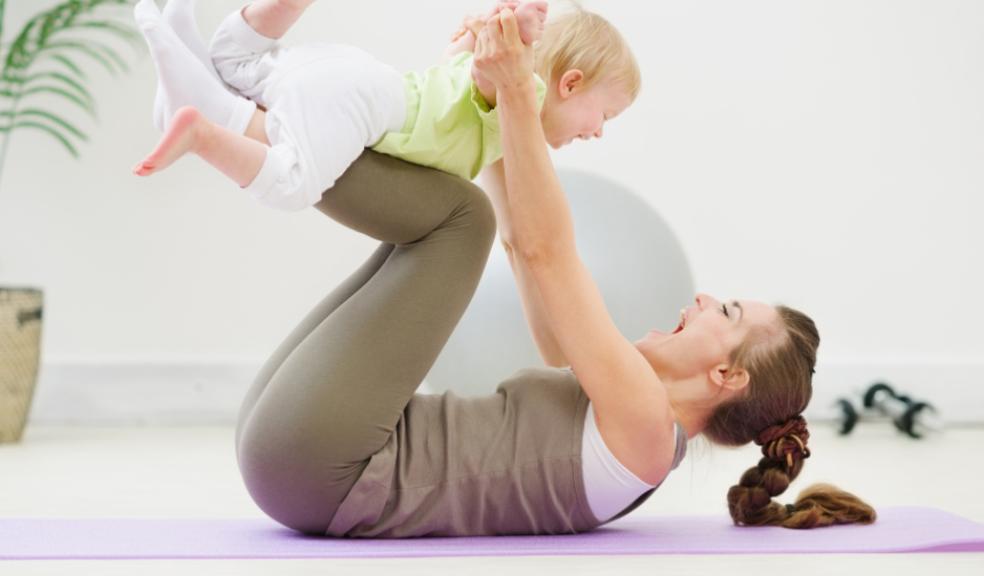 picture of a mum and baby exercising