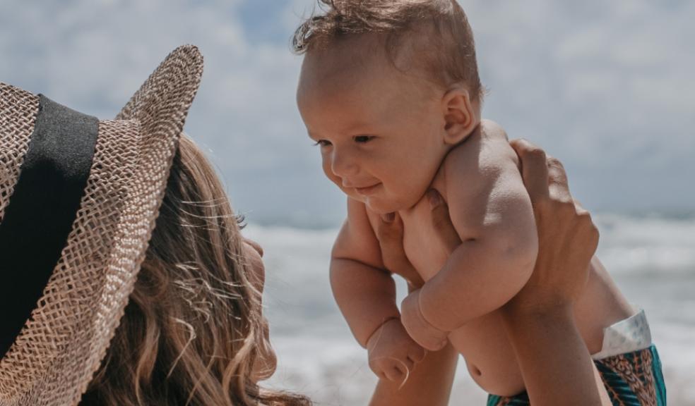 mum and baby outside picture of a mum and baby outside
