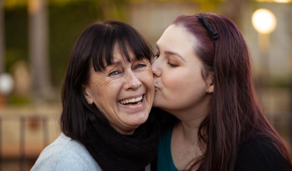 picture of a mum and daughter laughing