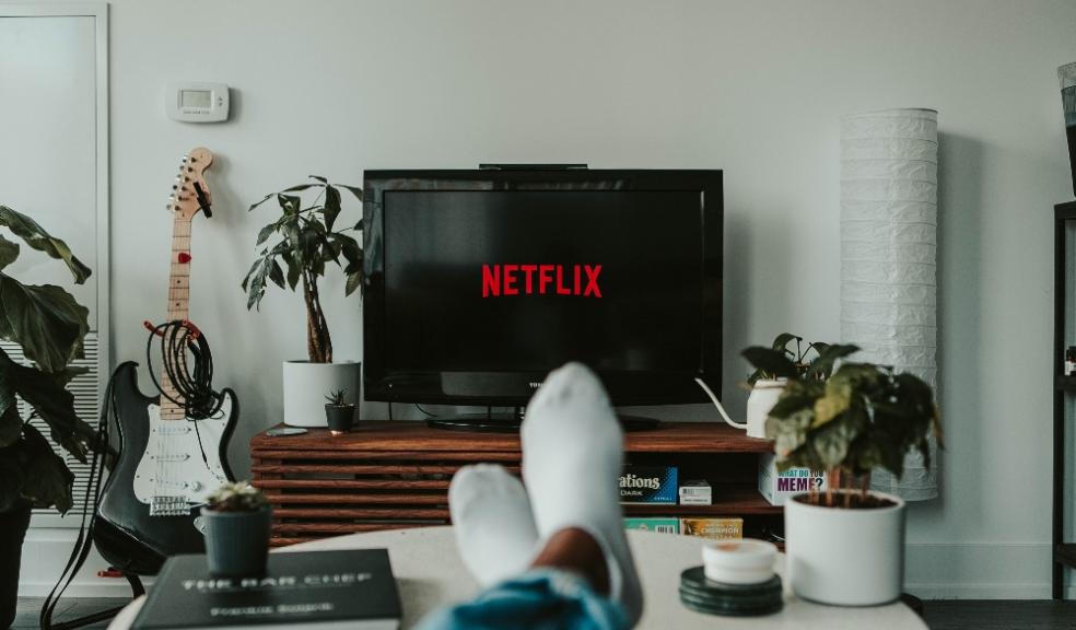 picture of somebody sat down watching netflix on tv