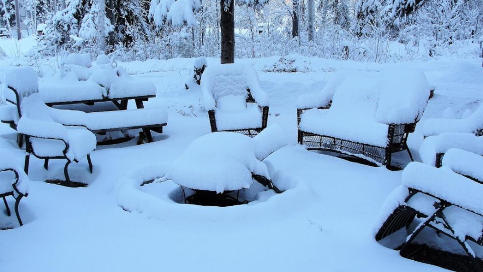 picture of outdoor furniture covered in snow