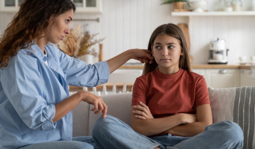 picture of a parent talking to teenager