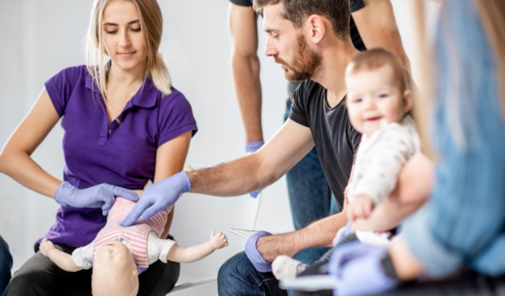 picture of parents learn baby first aid