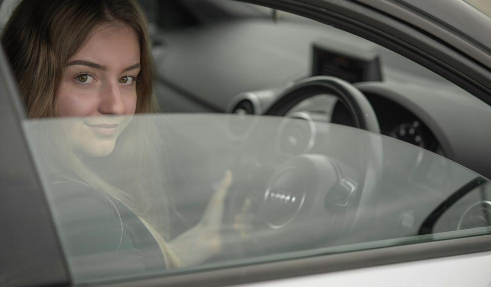 teenager driving a car