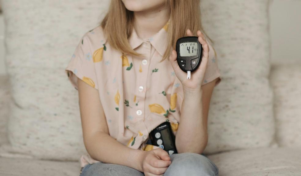picture of a child with a stopwatch timer