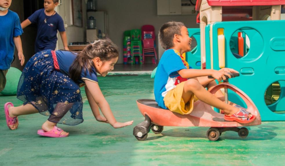 picture of children having fun playing outside picture of children having fun playing outside