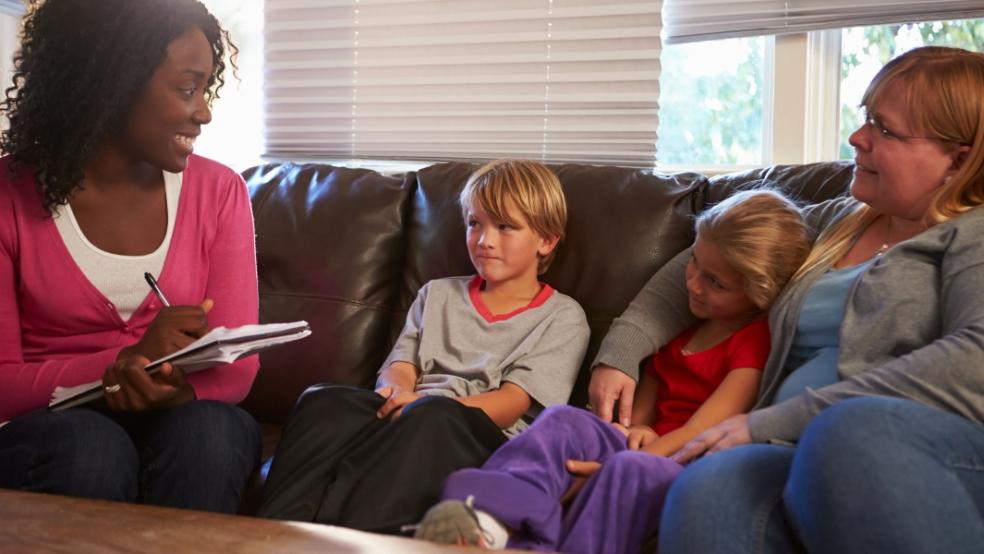 picture of social worker with family