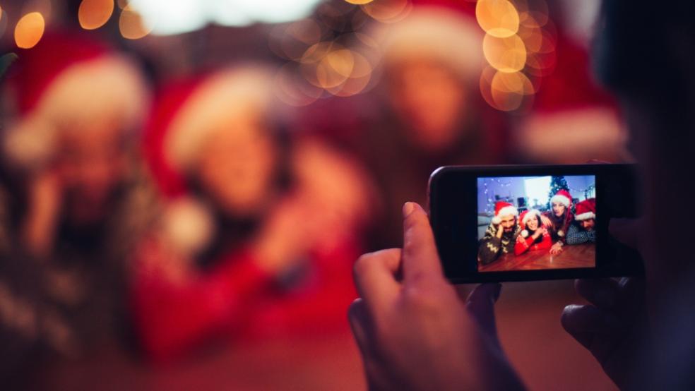 picture of someone taking a photo at Christmas