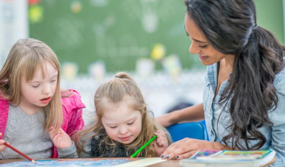 picture of teacher with children with additional needs