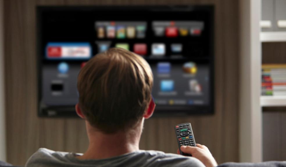 picture of a teen watching tv