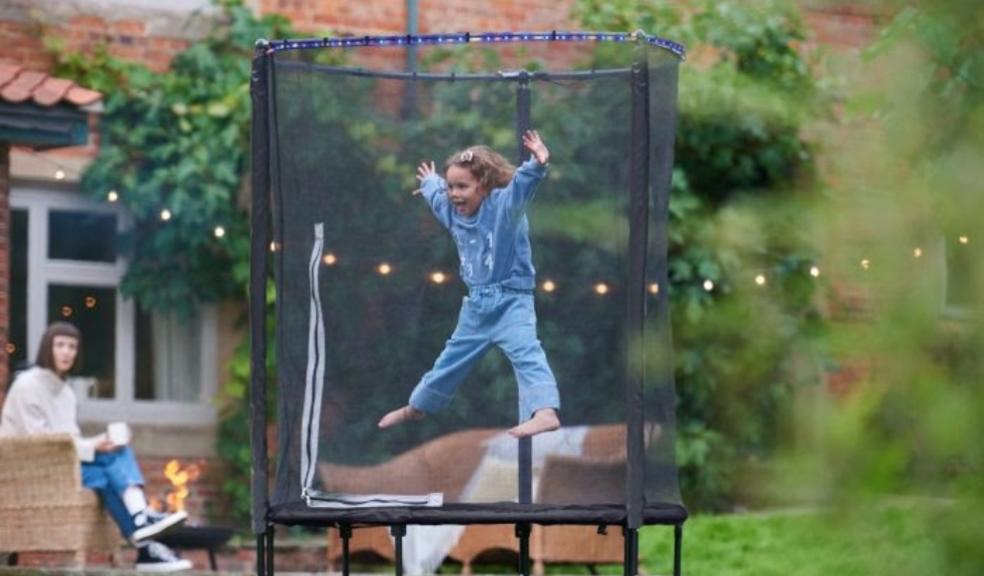 picture of a girl on plum play interactive trampoline