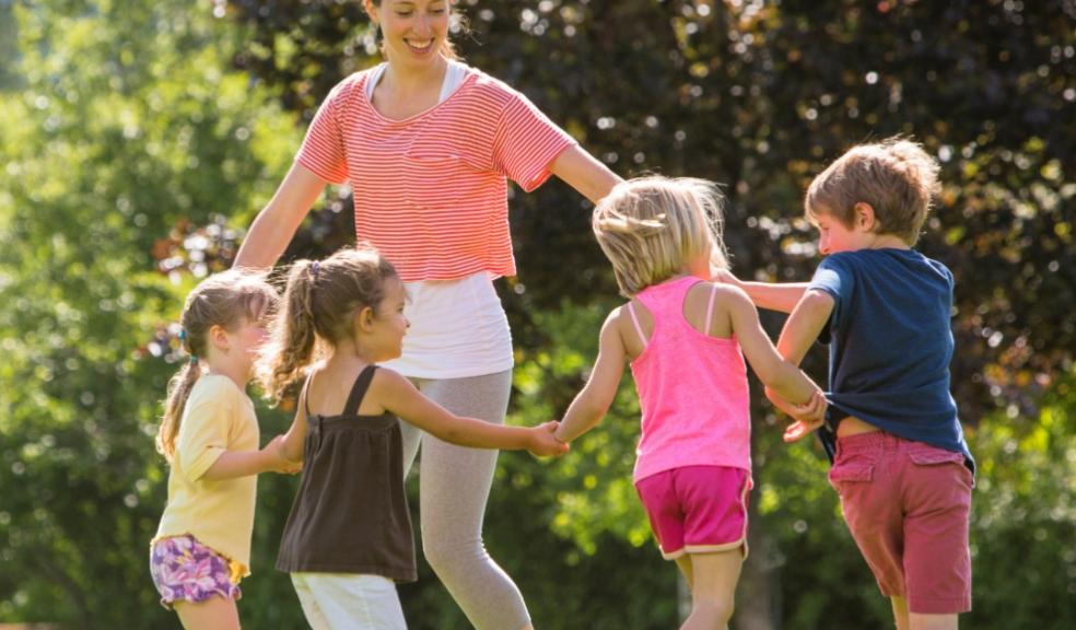 picture of children playing together outside
