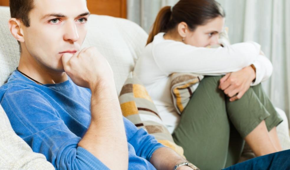 picture of a couple sat next to eachother