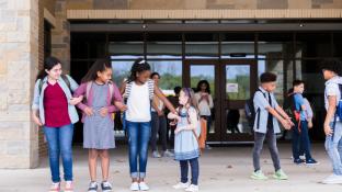 picture of children outside a school
