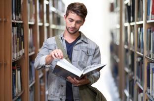 picture of a teenage boy in a library