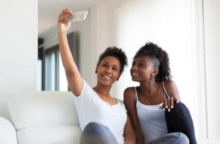 picture of teenage girls taking a selfie
