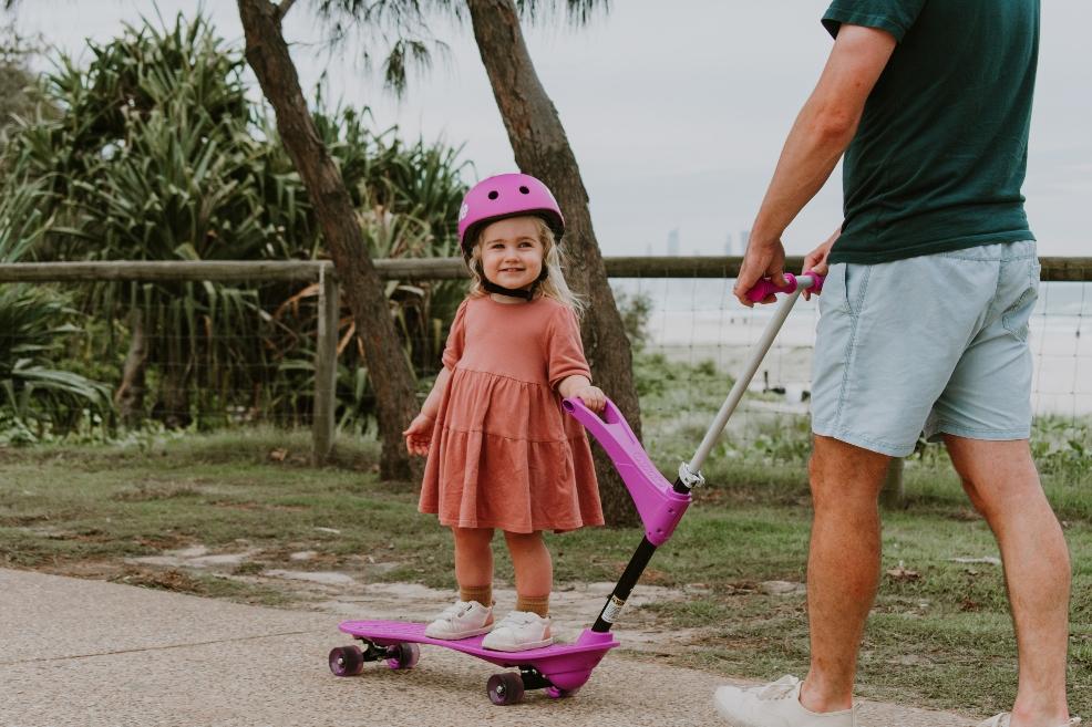 picture of a child on a ookkie skateboard