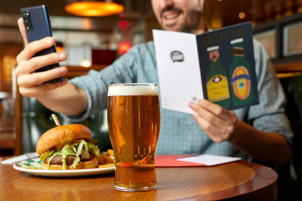 picture of a pub mean and pint of beer