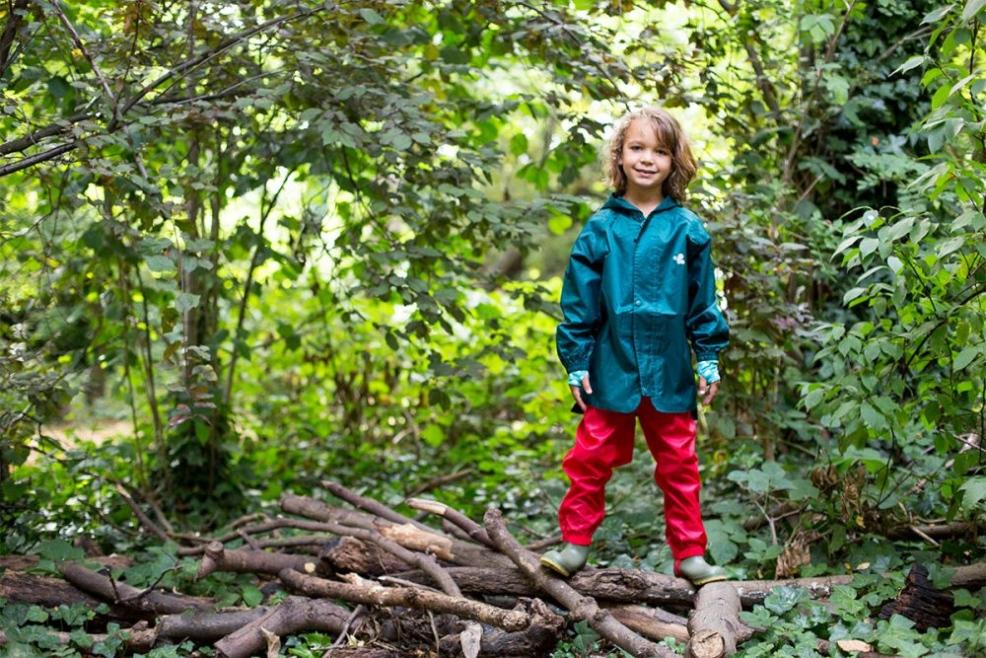 picture of a child in the woods
