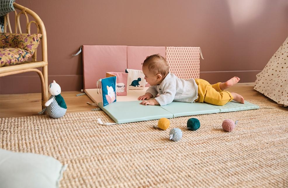 picture of a baby playing with sensory toys