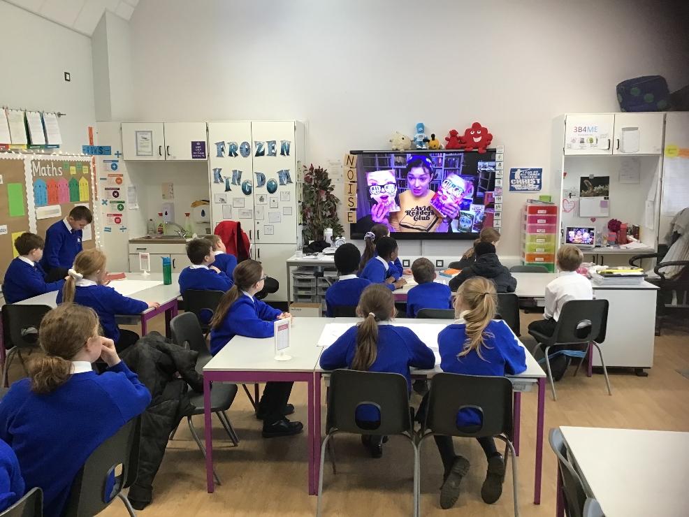 picture of Last year's winning class having a zoom with award-winning author, M.G.Leonard.