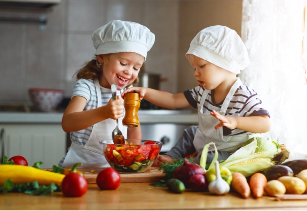 picture of happy children making some health foods
