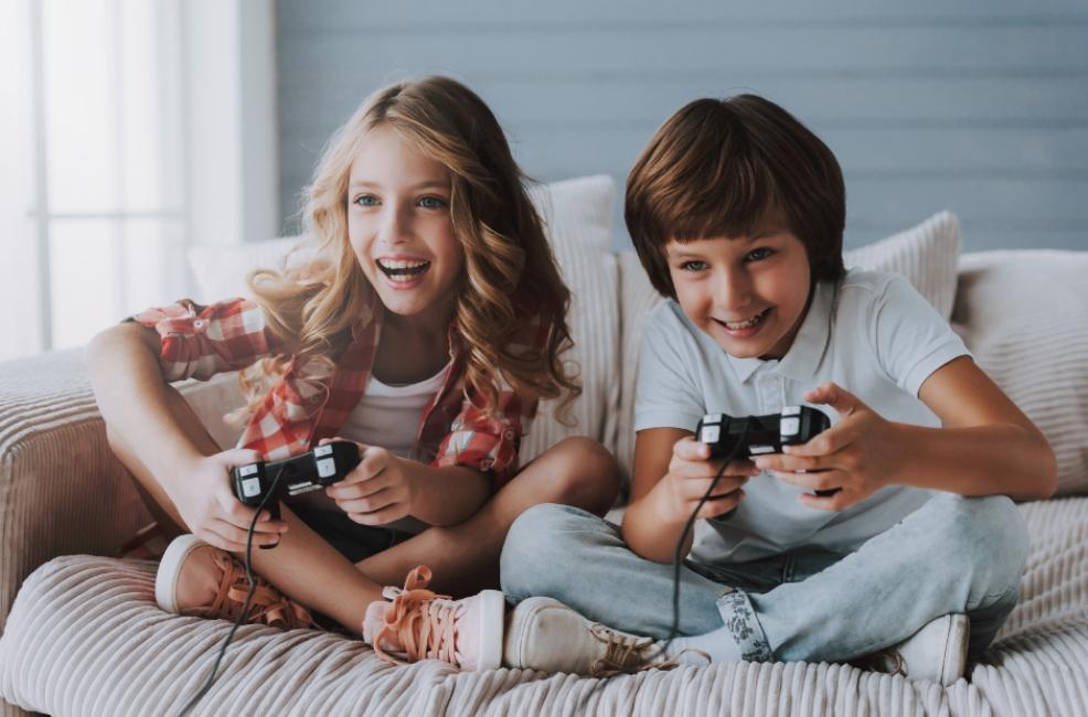 picture of boy and girl playing video games