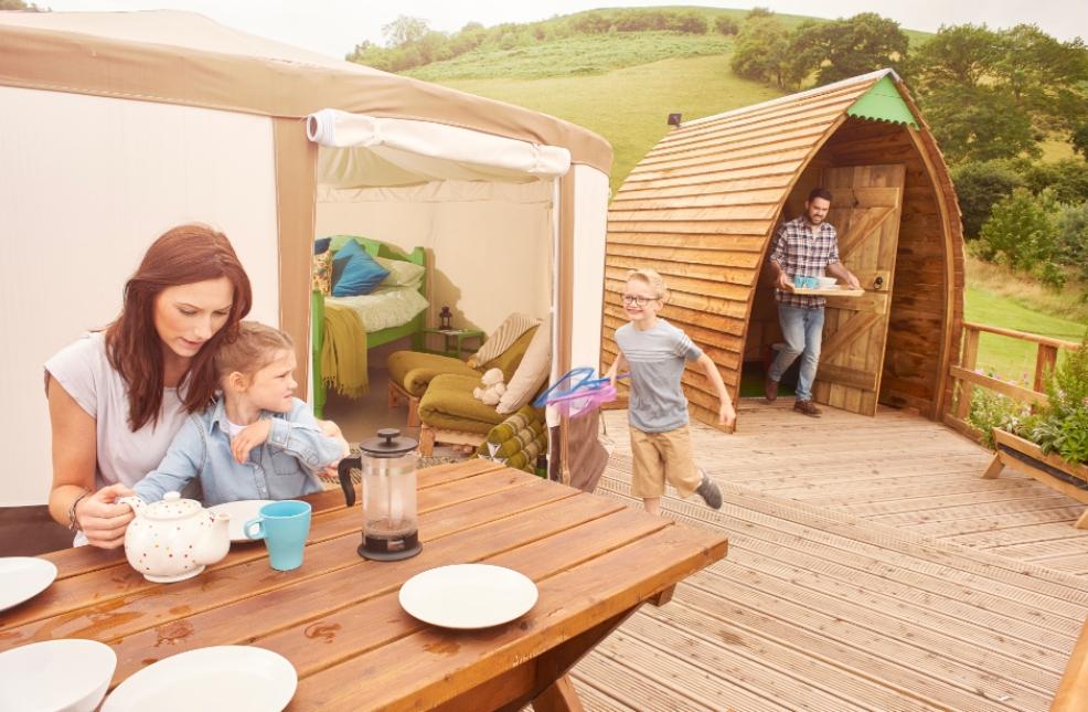 picture of holidaymakers on a yurt holiday