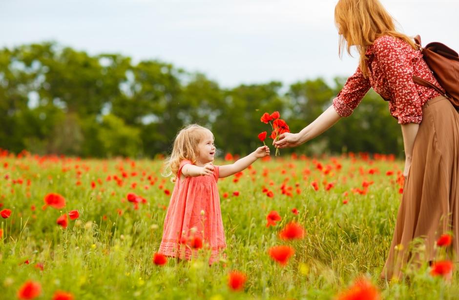 picture of mother and daughter picking flowers