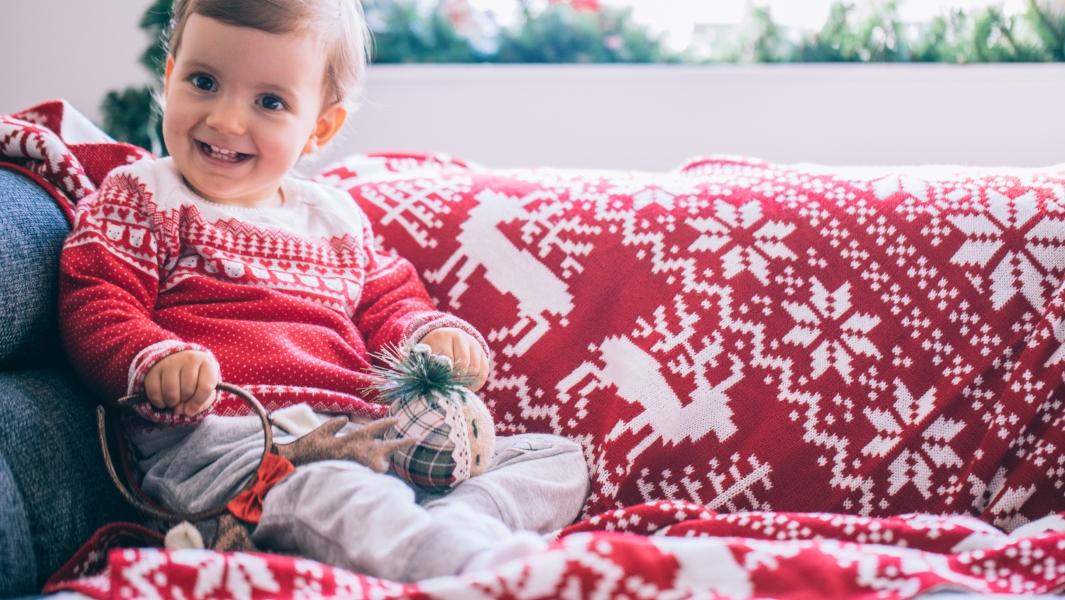 picture of a child on a christmas blanket