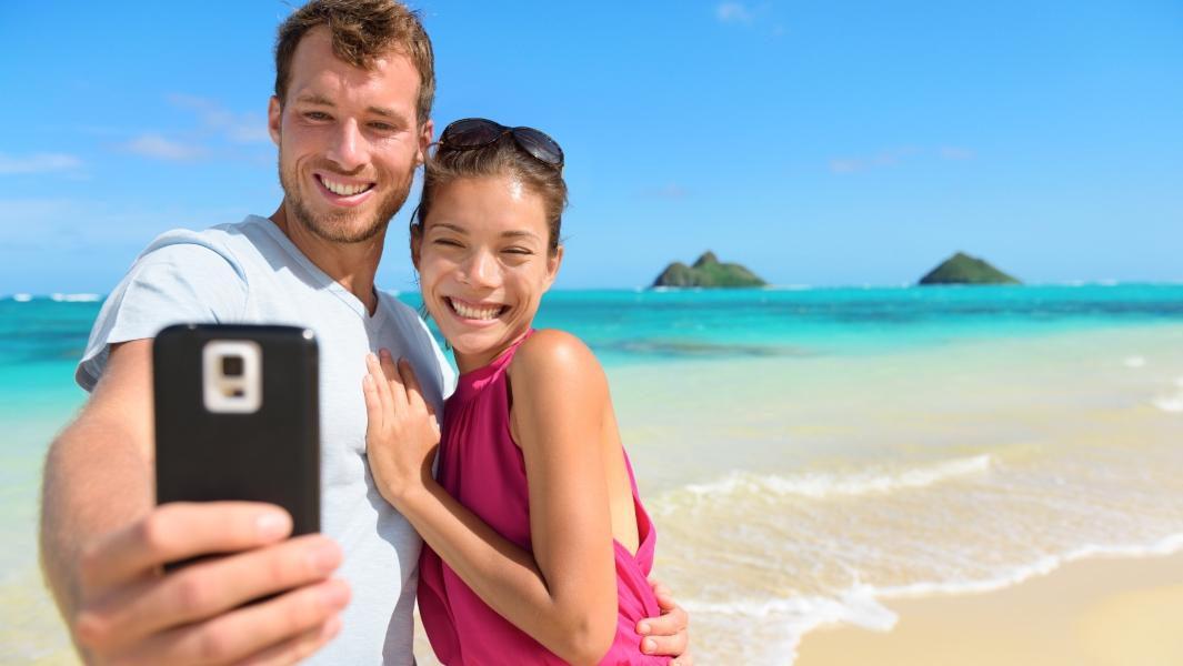 picture of a couple taking a holiday photo