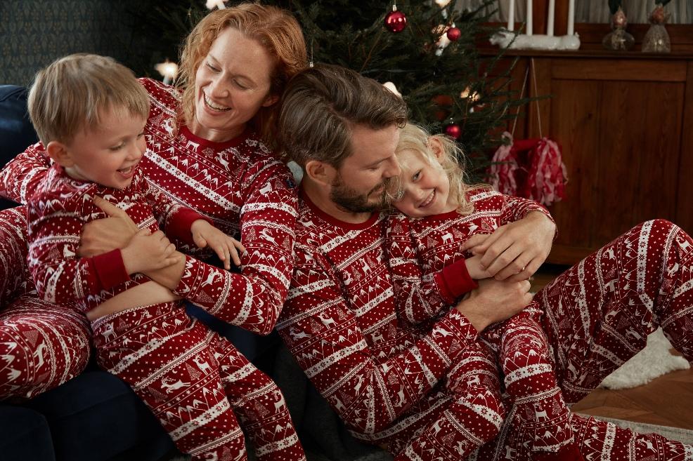 picture of a family in matching childrens pyjamas
