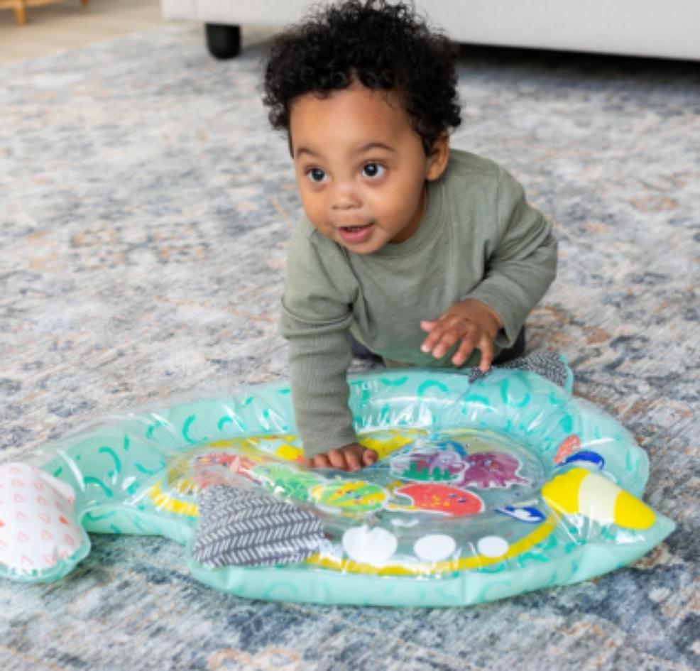 picture of baby playing with infantino pat and play playmat