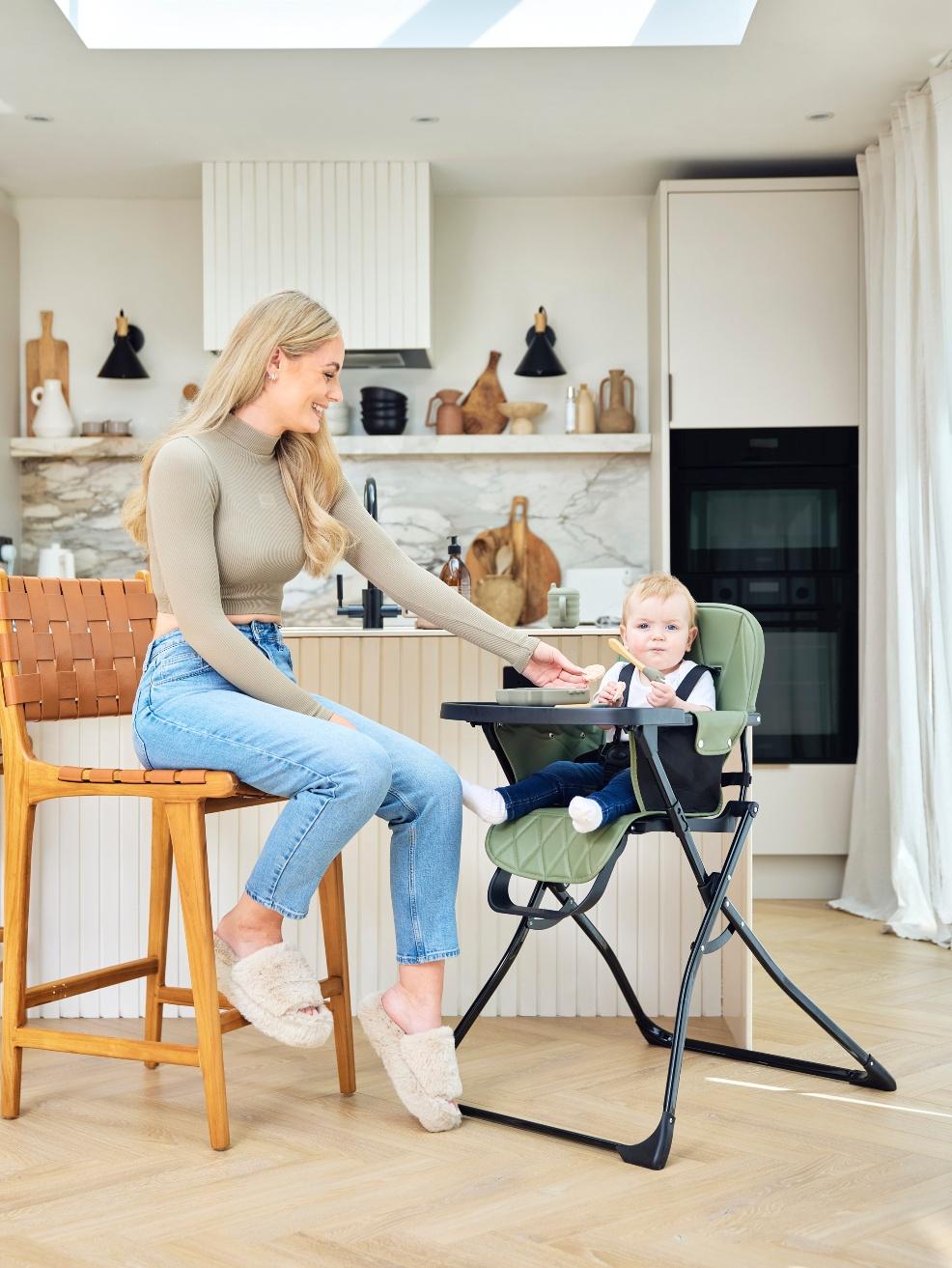 a mum and baby using the Flip Magic Fold Highchair in a neutral kitchen picture of a mum and baby using the Flip Magic Fold Highchair in a neutral kitchen