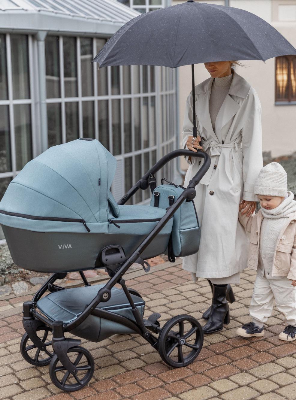a mum and toddler pushing a Tuti Viva 5 stroller picture of a mum and toddler pushing a Tuti Viva 5 stroller
