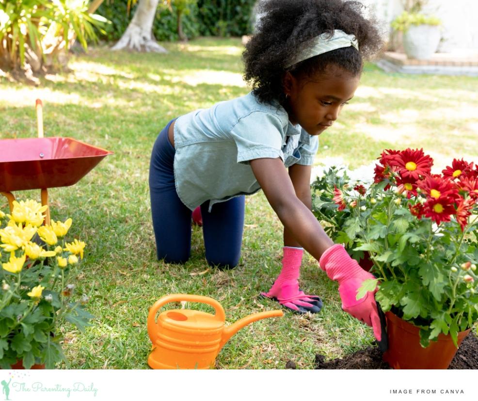 a child gardening as a easy summer activity outside in the garden picture of a child gardening as a easy summer activity outside in the garden