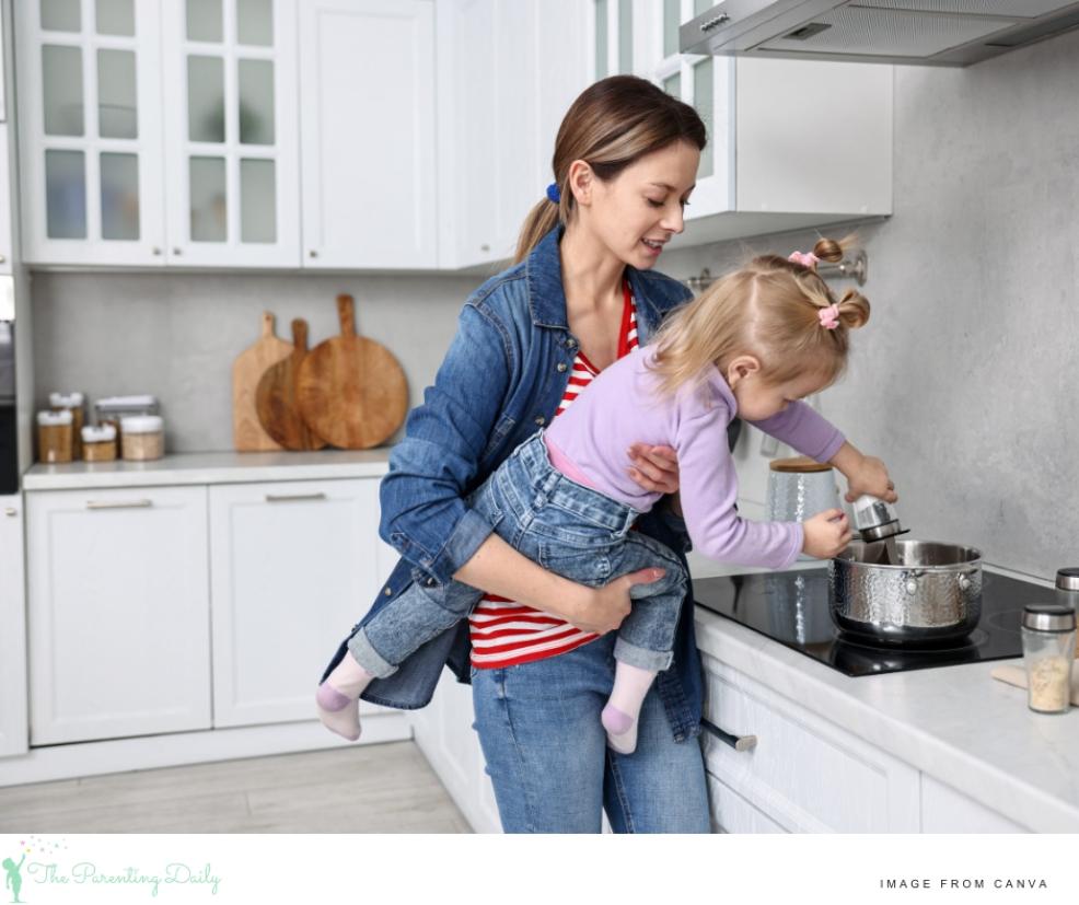 picture of a child helping her mum cook in the kitchen