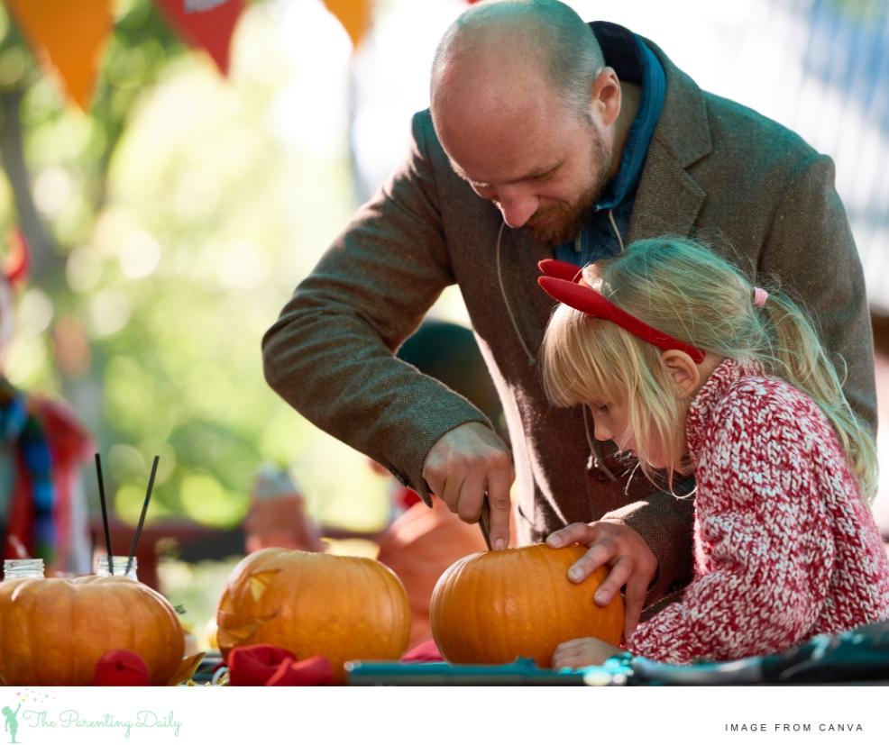 a father and daughter carving pumpkins as a nice autumn screen free activity idea picture of a father and daughter carving pumpkins as a nice autumn screen free activity idea