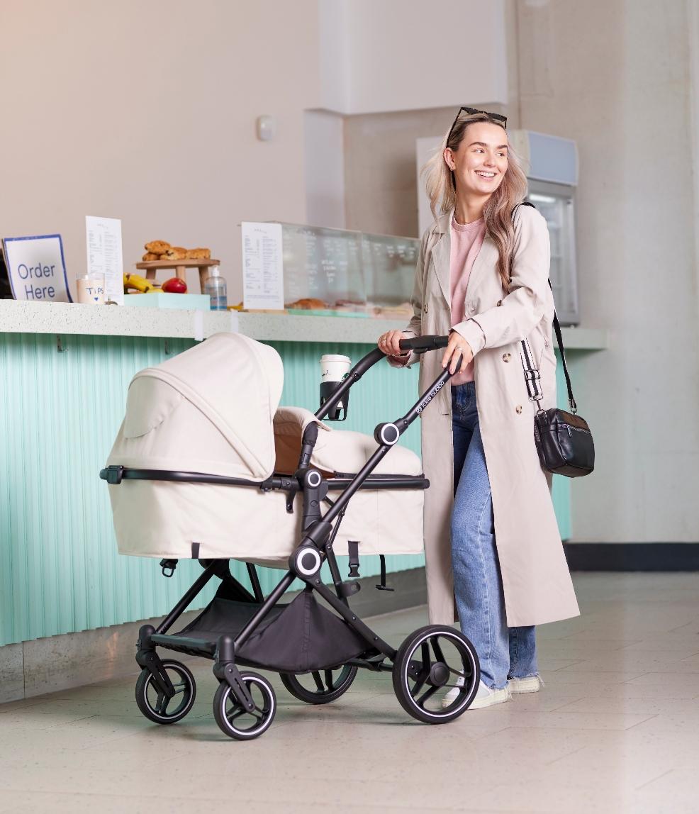 picture of Ickle Bubba Atom Travel System with mum in a cafe