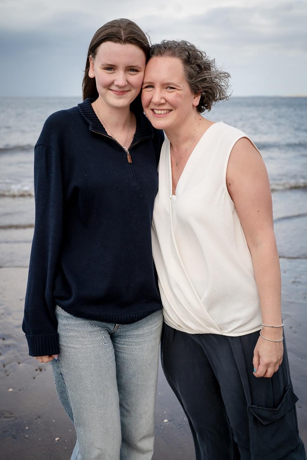 picture of Kirsty Maynor and her daughter at the beach