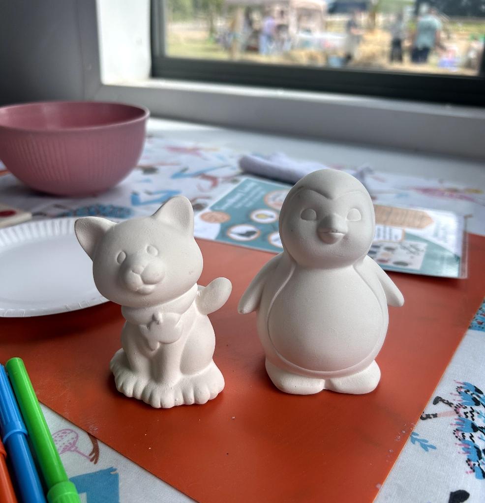 picture of a cat and penguin pottery mold for pottery painting